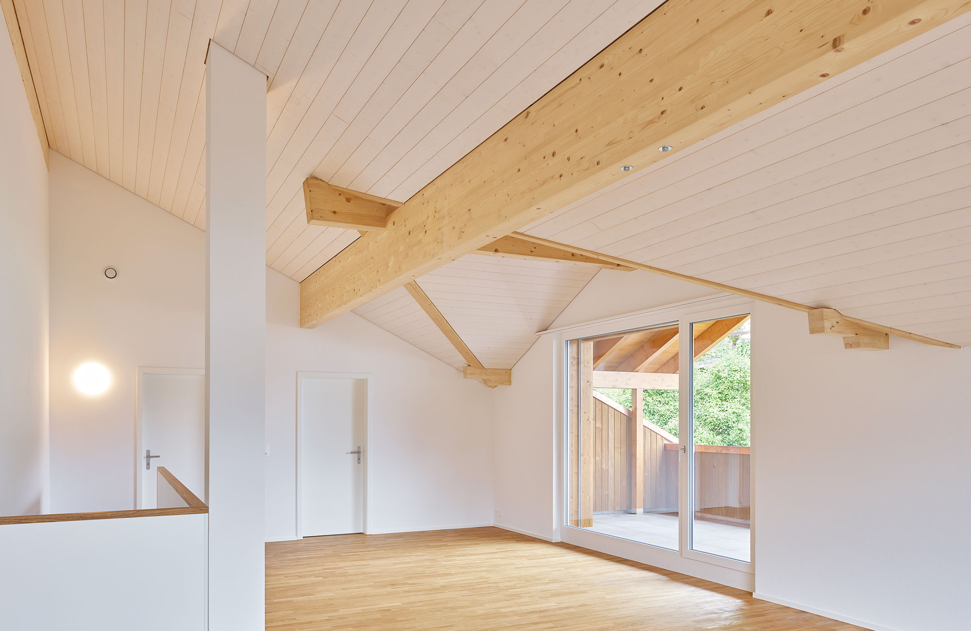 Dachgeschoss in Mehrfamilienhaus in Holzbau